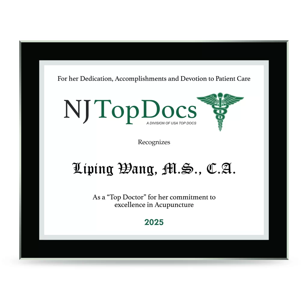framed plaque recognizing Liping Wang as a top doctor for her commitment to excellence in acupuncture